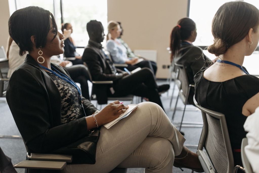 Young entrepreneurs, women, and persons with disabilities participating in a business and skills development workshop in Ghana.